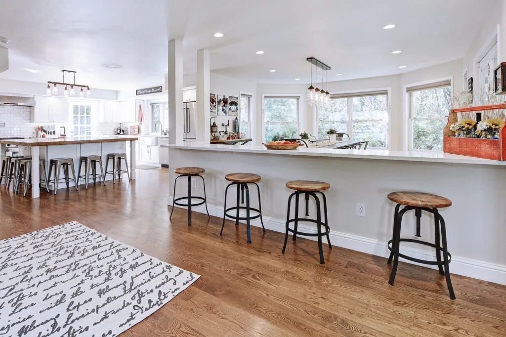 Panoramic kitchen view with recessed lights